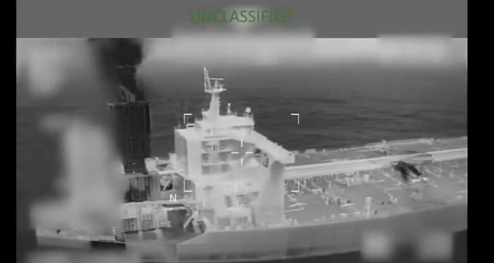 Aerial thermal view of Russian-flagged oil tanker with helicopter on deck as U.S. forces seize vessel