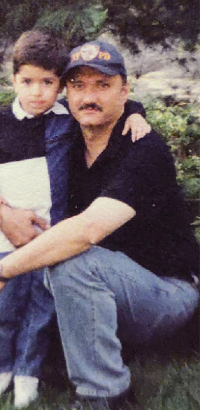 Father and disabled son outdoors, with father wearing a cap and holding his son close, related to ICE blocking attendance.