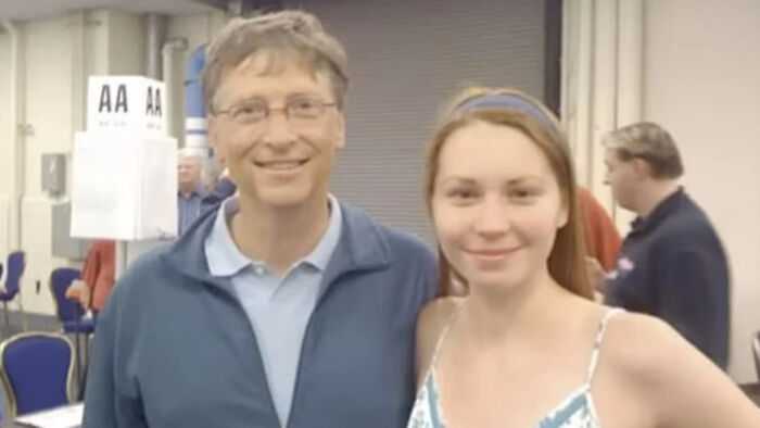 Bill Gates posing indoors with a young woman, relating to disturbing details and Epstein Russian mistress allegations.