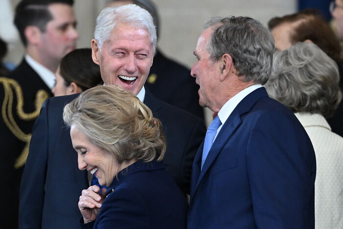 Three former US presidents smiling and talking, linked to vanished Mexican model claims in Epstein files discussion.