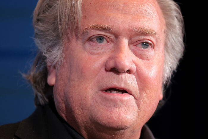 Close-up of Steve Bannon speaking at an event, related to MAGA influencers reacting to Epstein ties controversy.
