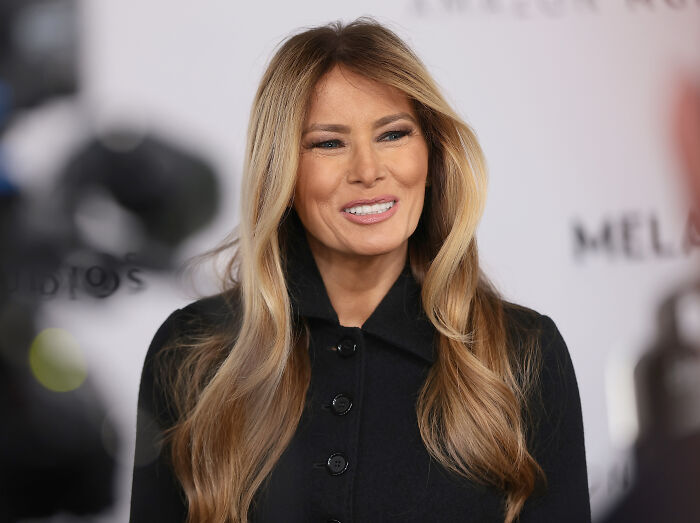 Melania Trump at a documentary event, smiling with long blonde hair, highlighting Melania Trump documentary box office success. Melania Trump at a documentary event, smiling with long blonde hair, highlighting Melania Trump documentary box office success.