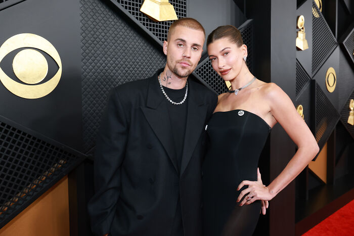 Justin Bieber and Hailey Bieber posing on the red carpet at the Grammys where stars spoke out against ICE. Justin Bieber and Hailey Bieber posing on the red carpet at the Grammys where stars spoke out against ICE.